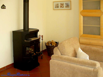 Wohnzimmer mit Kamin Ferienhaus Rgen Residenz Losentitz